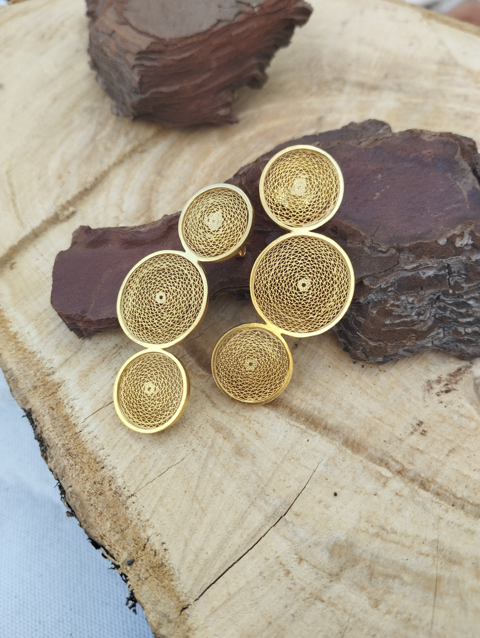 Brincos Triplos